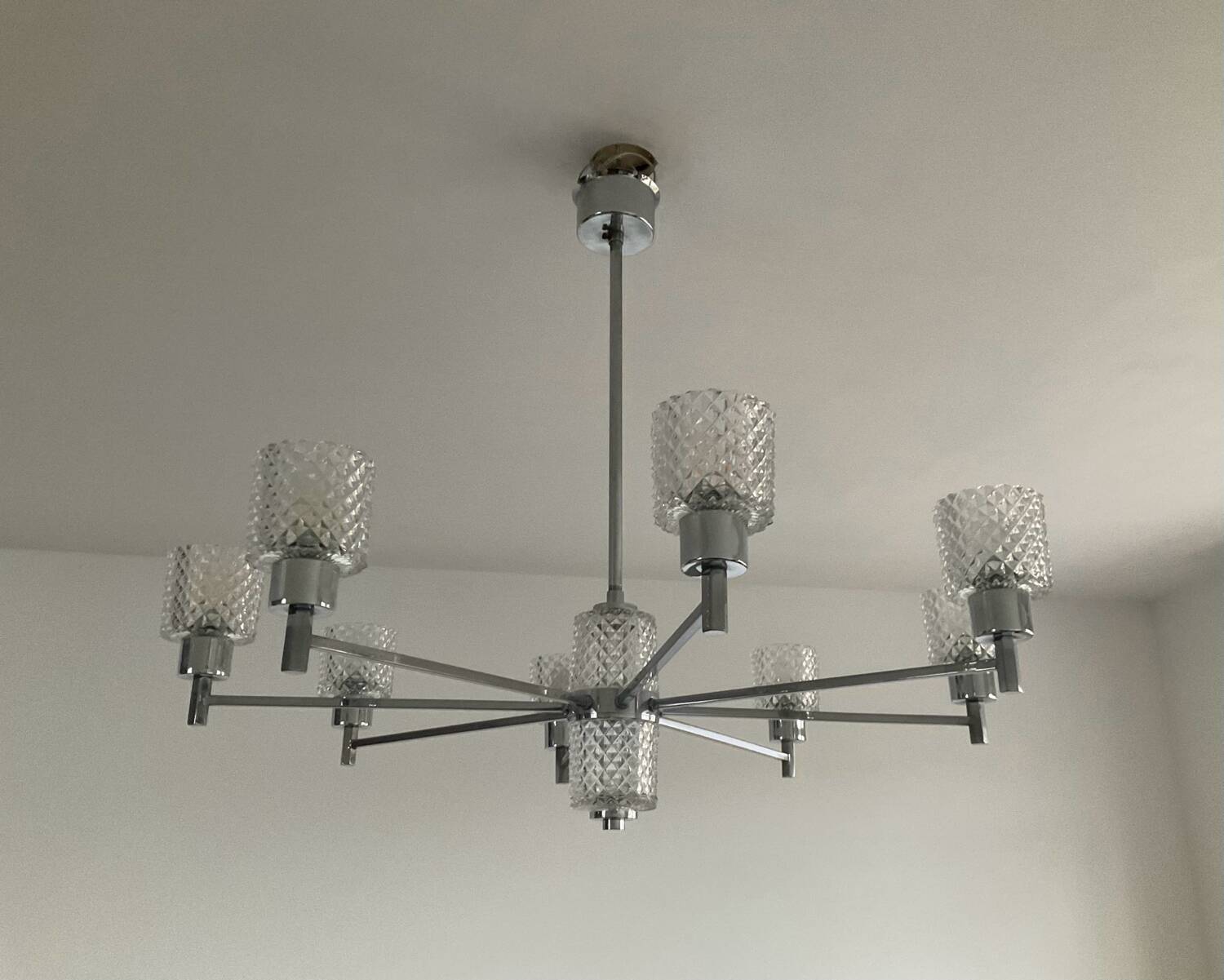 Vintage Italian chandelier from the 60s in chromed metal and glass