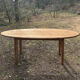 Oval solid wood dining table