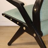 Vintage armchair from the 1960s in black wood and fabric.