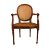 Armrest armchair made of cherry wood