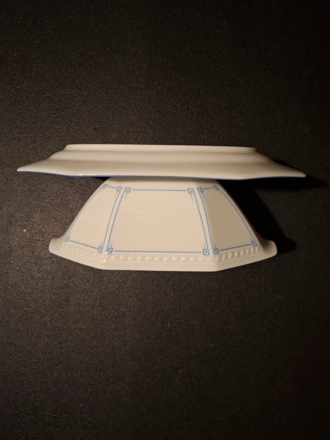 Dishes and porcelain sauceboat