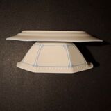 Dishes and porcelain sauceboat