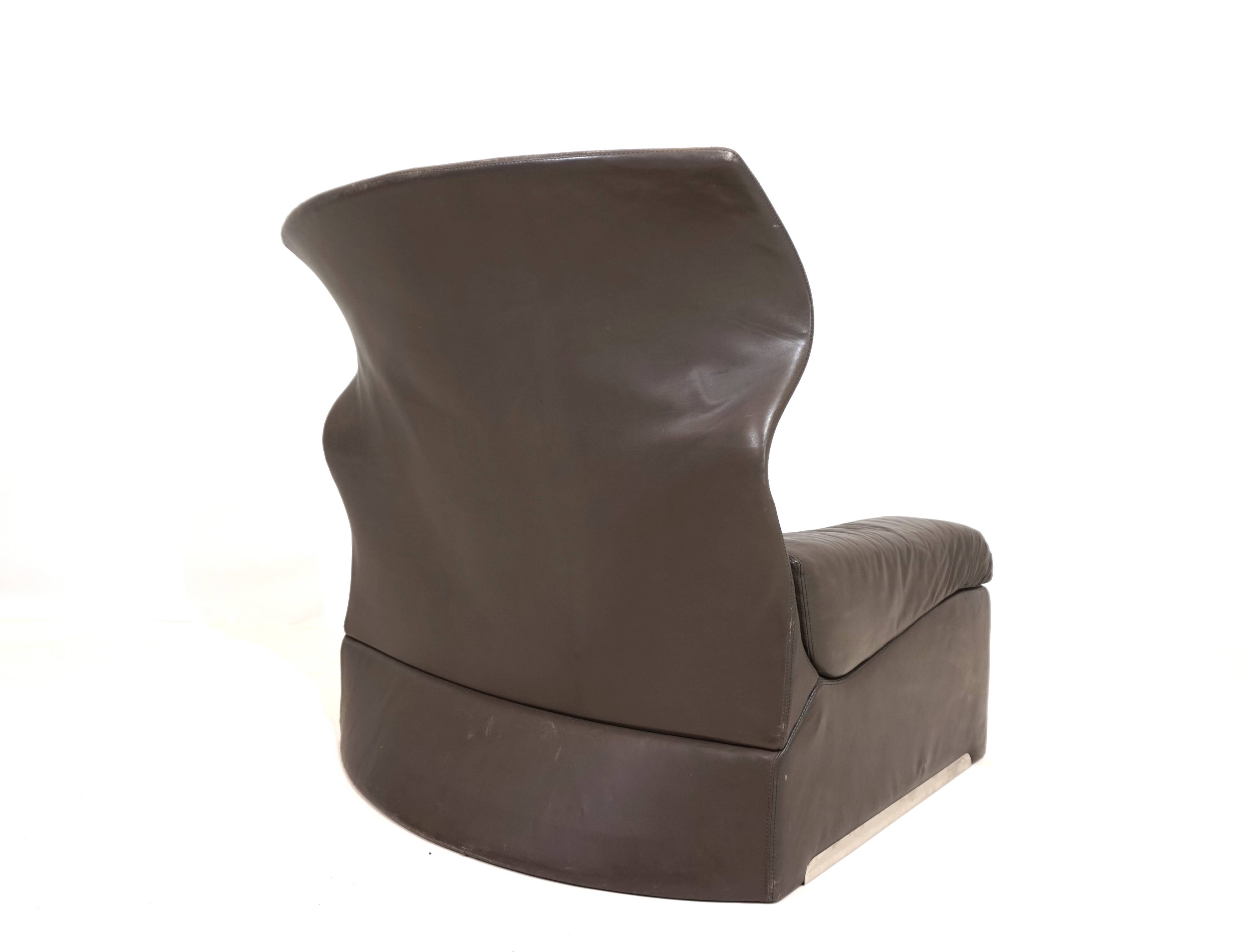 Saporiti Vela Alta leather armchair with ottoman by Giovanni Offredi