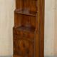 Pair of vintage English hardwood bookcases in a cascade style with cupboards.