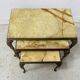 Set of three nesting tables in onyx and brass, 20th century.