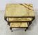 Set of three nesting tables in onyx and brass, 20th century.