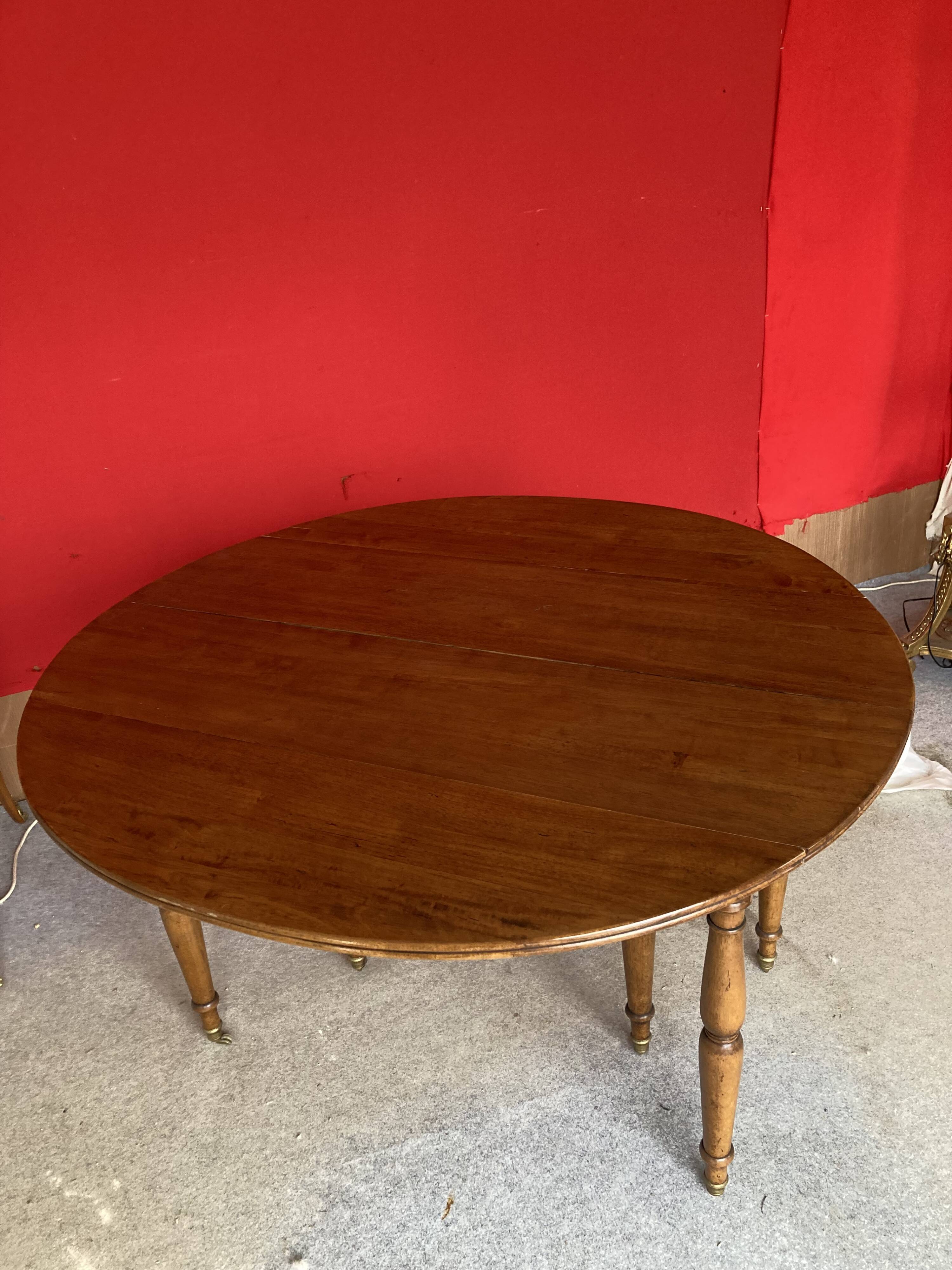 Cherry wood drop-leaf table.