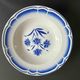 Set of 9 vintage deep plates with blue patterns.