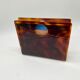 Lucite magazine rack "tortoiseshell", 1970s