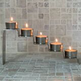 Chrome-plated metal candle holder