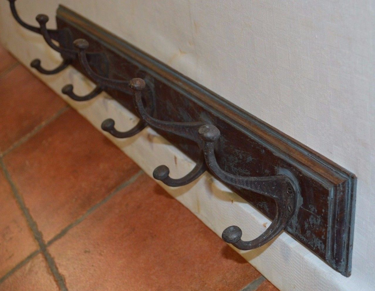 School coat rack with cast iron pegs