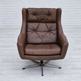 Années 1970, chaise pivotante danoise avec repose-pieds, bon état d'origine, cuir.