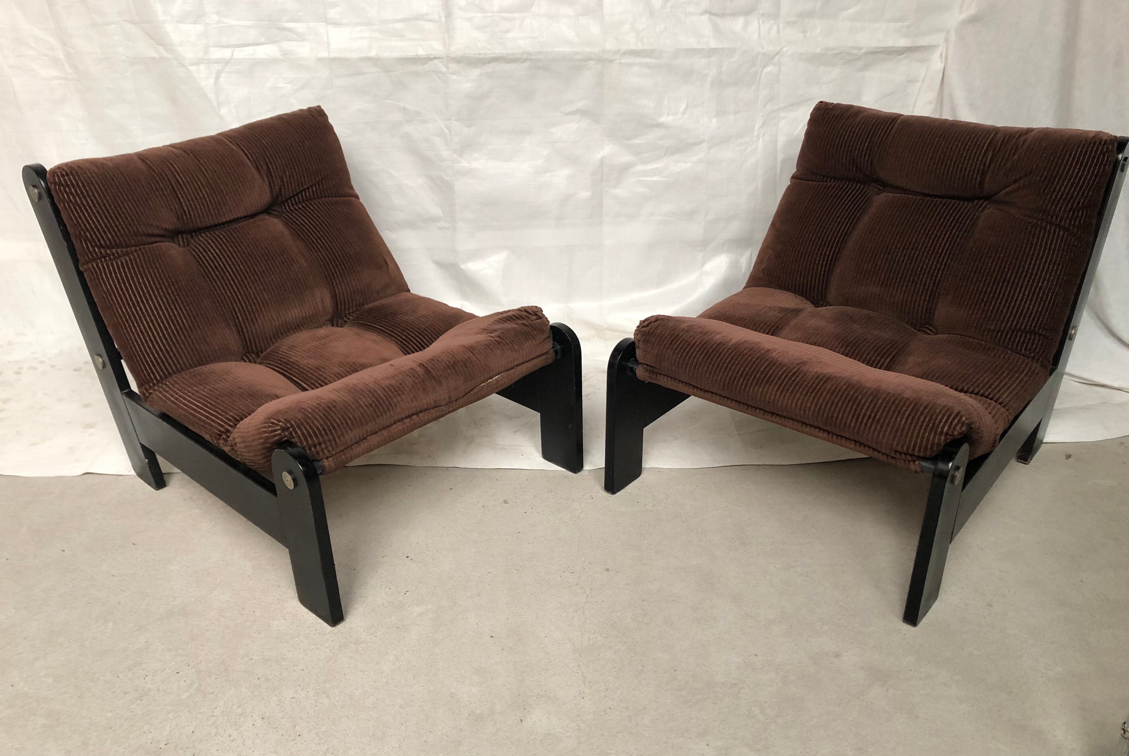 Modernist armchairs wood heaters and brown velvet vintage 70s