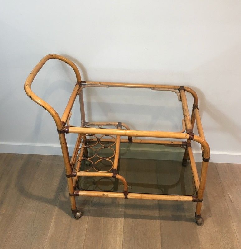 Rattan rolling table and leather ties