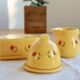 Vintage yellow ceramic milk jug – Hand-painted floral pattern