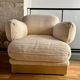 Pair of armchairs by Thibier in brass and wool France 1978