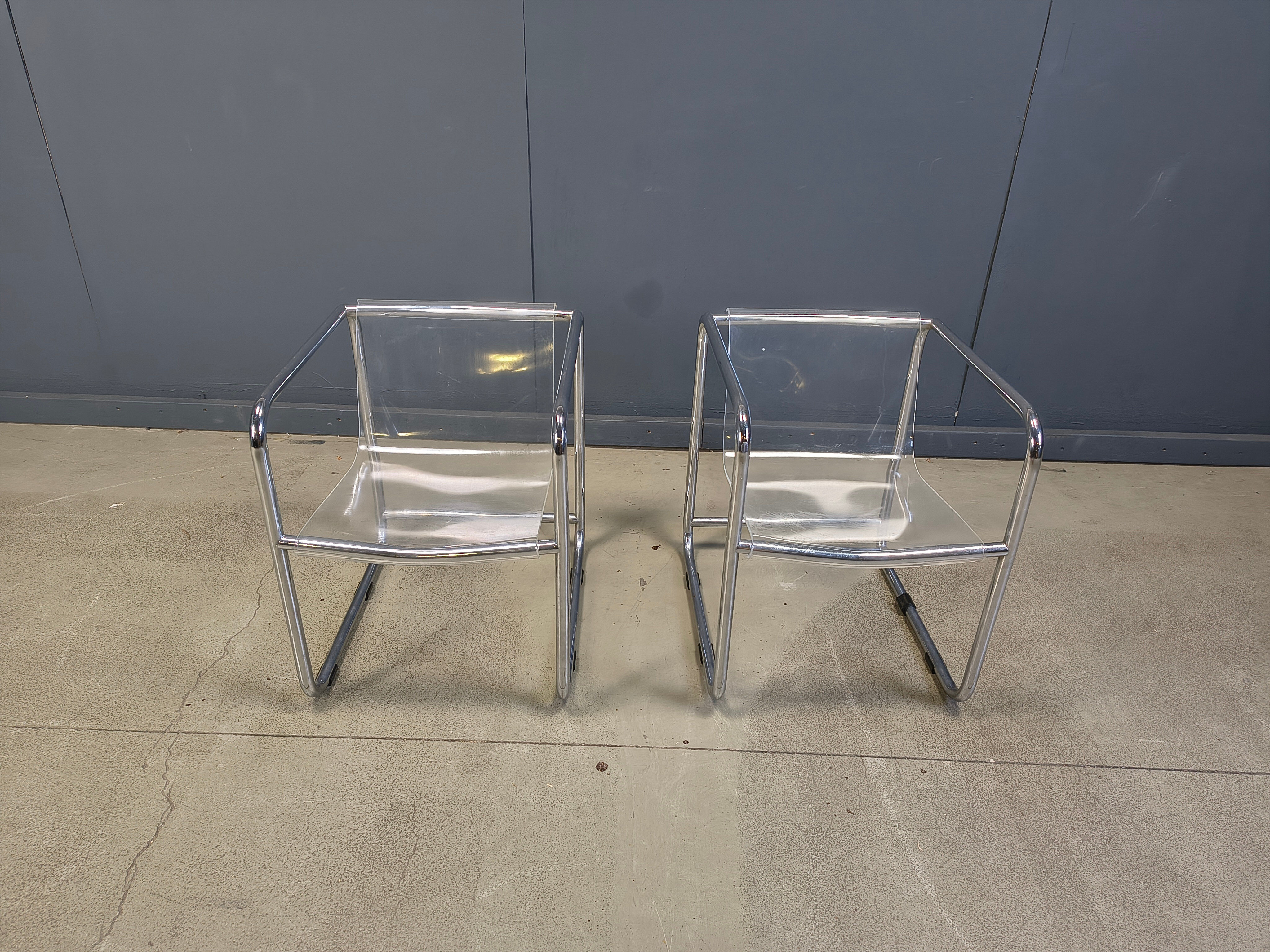 Pair of plexiglass and tubular chrome armchairs, 1970s