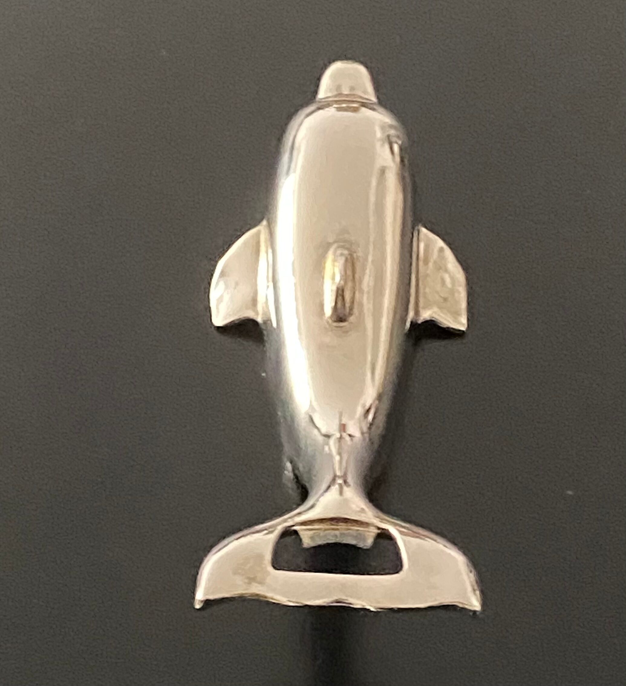 Bottle opener dolphin shape
