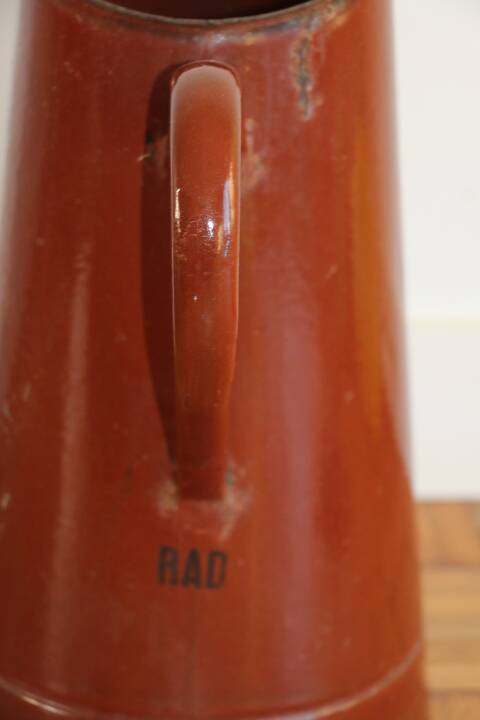 Brown enamelled steel pitcher