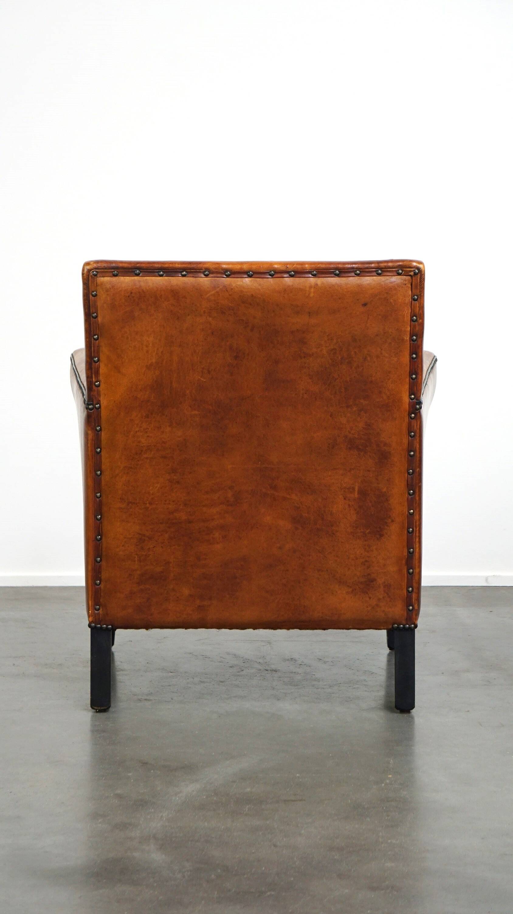Sleek sheepskin Art Deco design armchair with beautiful details