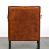 Sleek sheepskin Art Deco design armchair with beautiful details