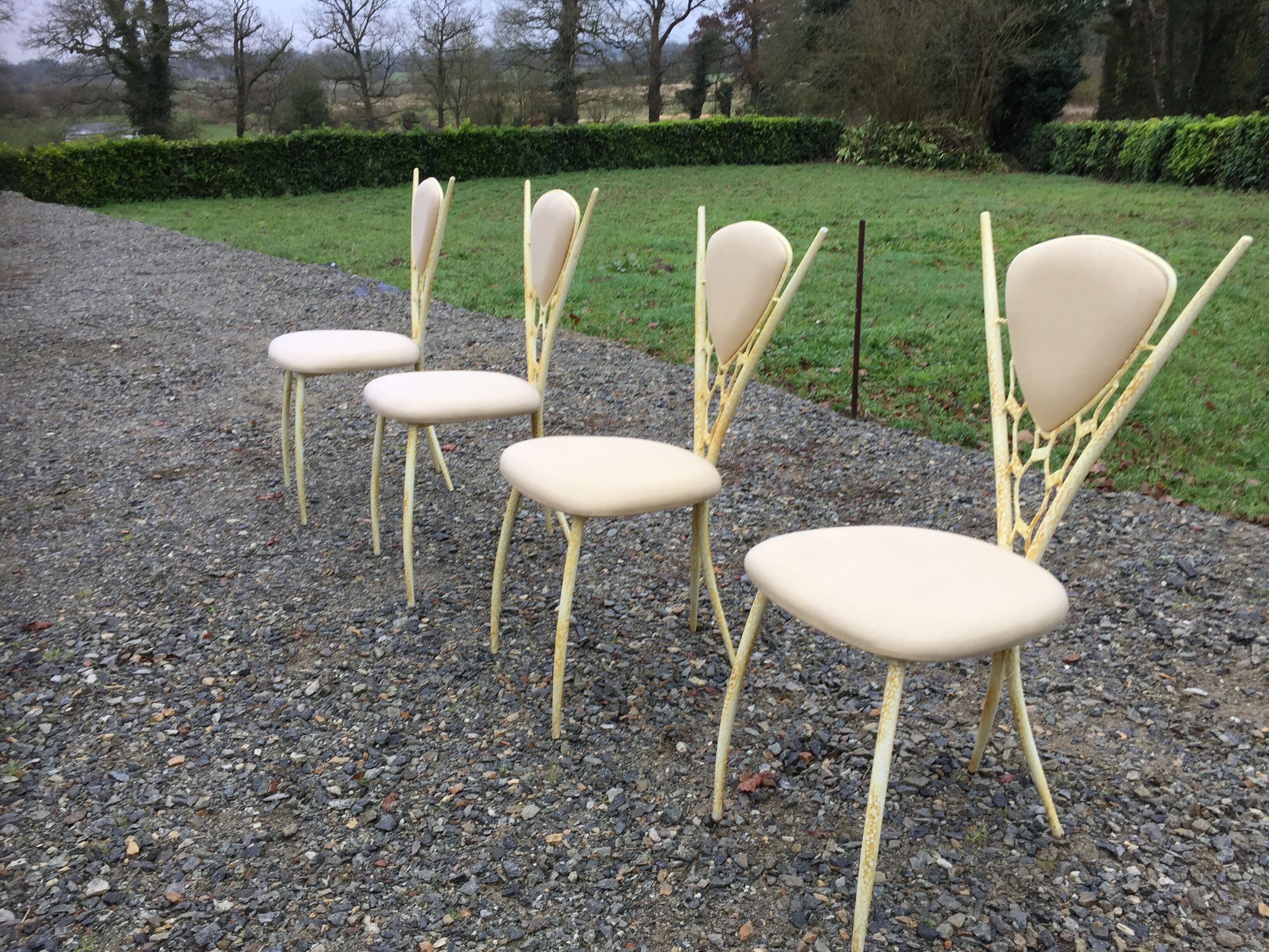4 vintage chairs in tubular metal lacquered white yellow.