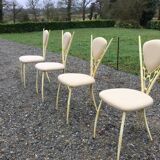 4 vintage chairs in tubular metal lacquered white yellow.