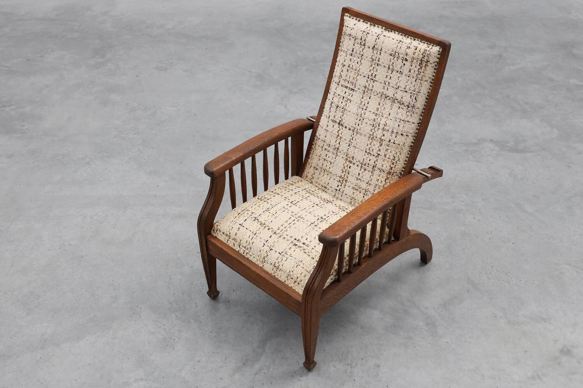 Arts & Craft oak armchair with spindle sides and tweed upholstery, Belgium