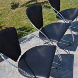 4 chrome and leather chairs designed by Italy