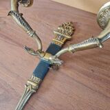 Pair of Empire style wall sconces in gilded bronze and green lacquer.