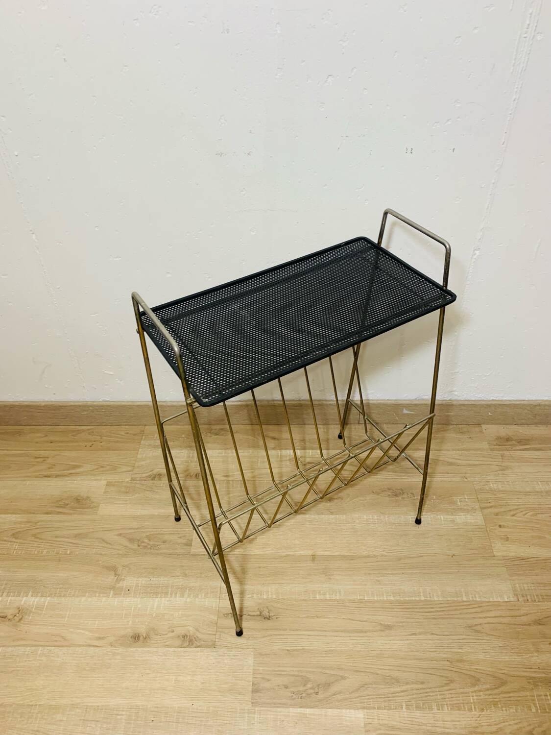 Perforated metal magazine rack