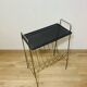 Perforated metal magazine rack