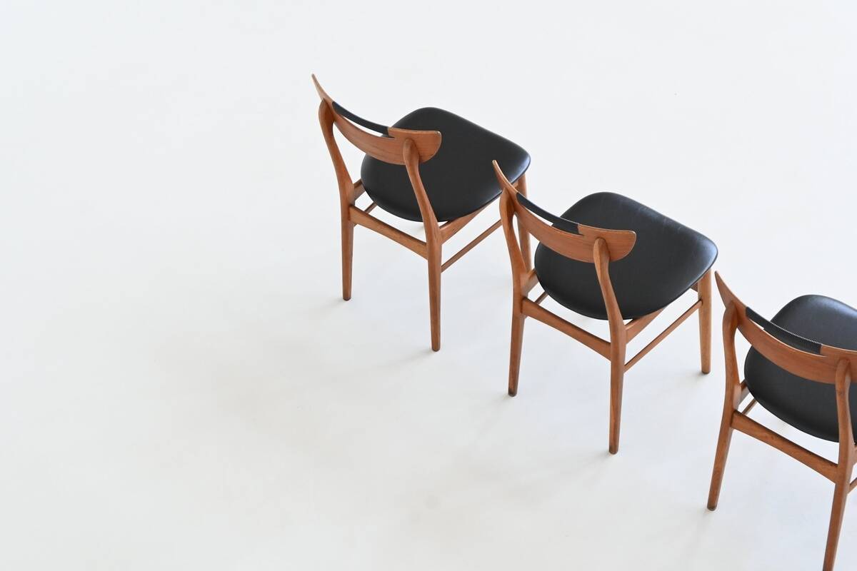 Set of six Danish dining chairs in teak and faux leather Denmark 1960