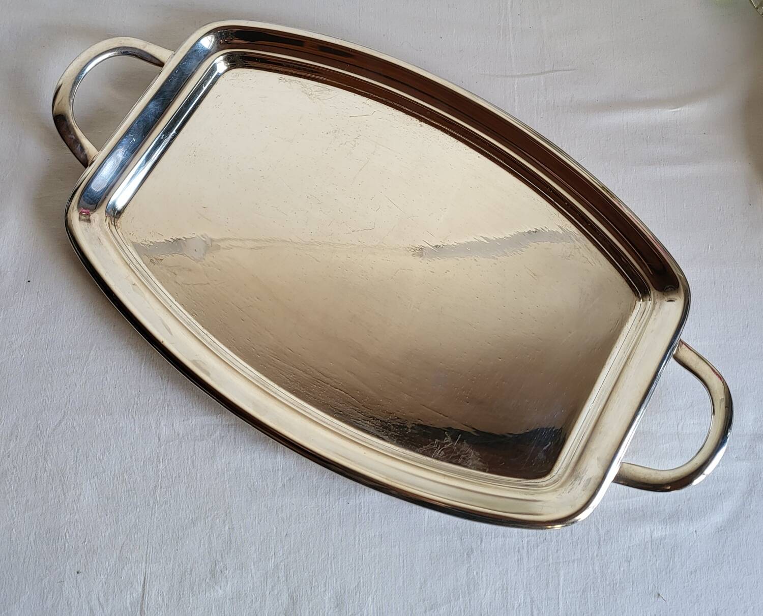 Silver-plated serving dish Quist and its asparagus cradle grid.