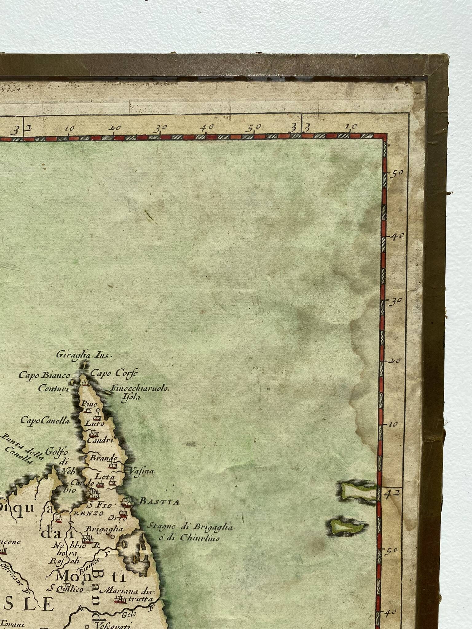 Old map of the Isle of Corsica framed under glass