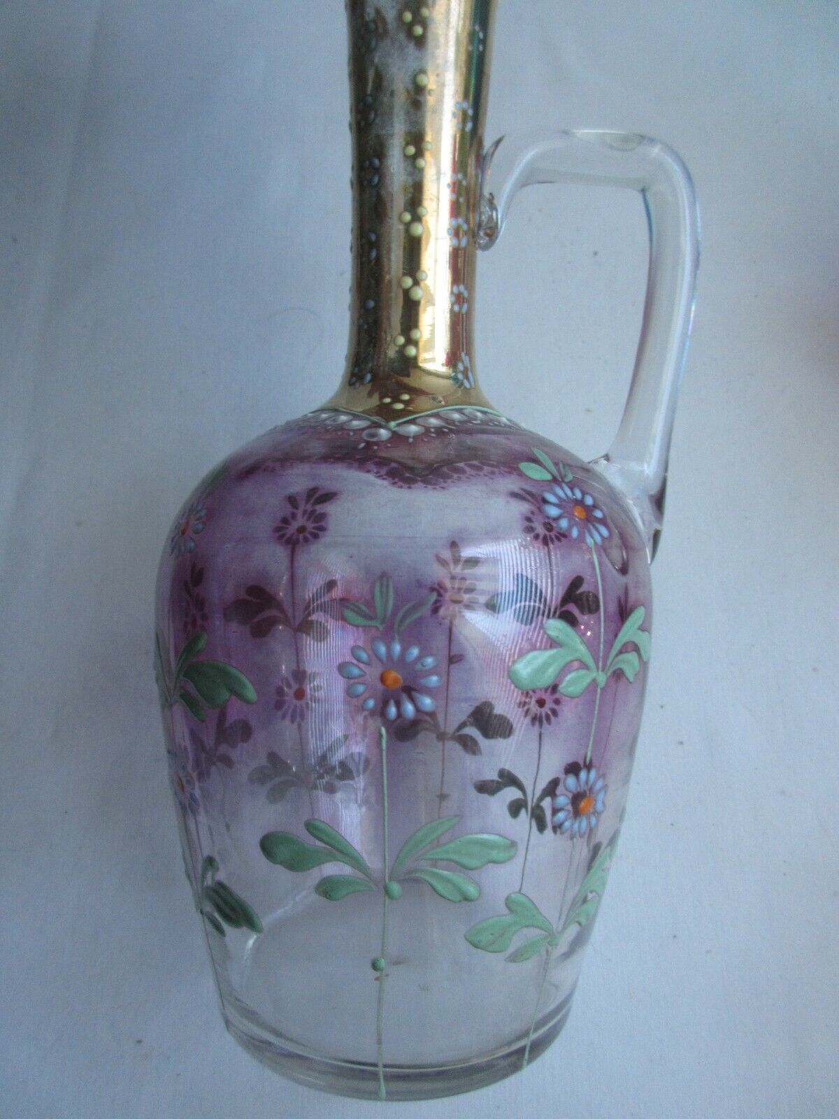 Art Nouveau ewer decanter, gilded glass and violin enamelled with daisies