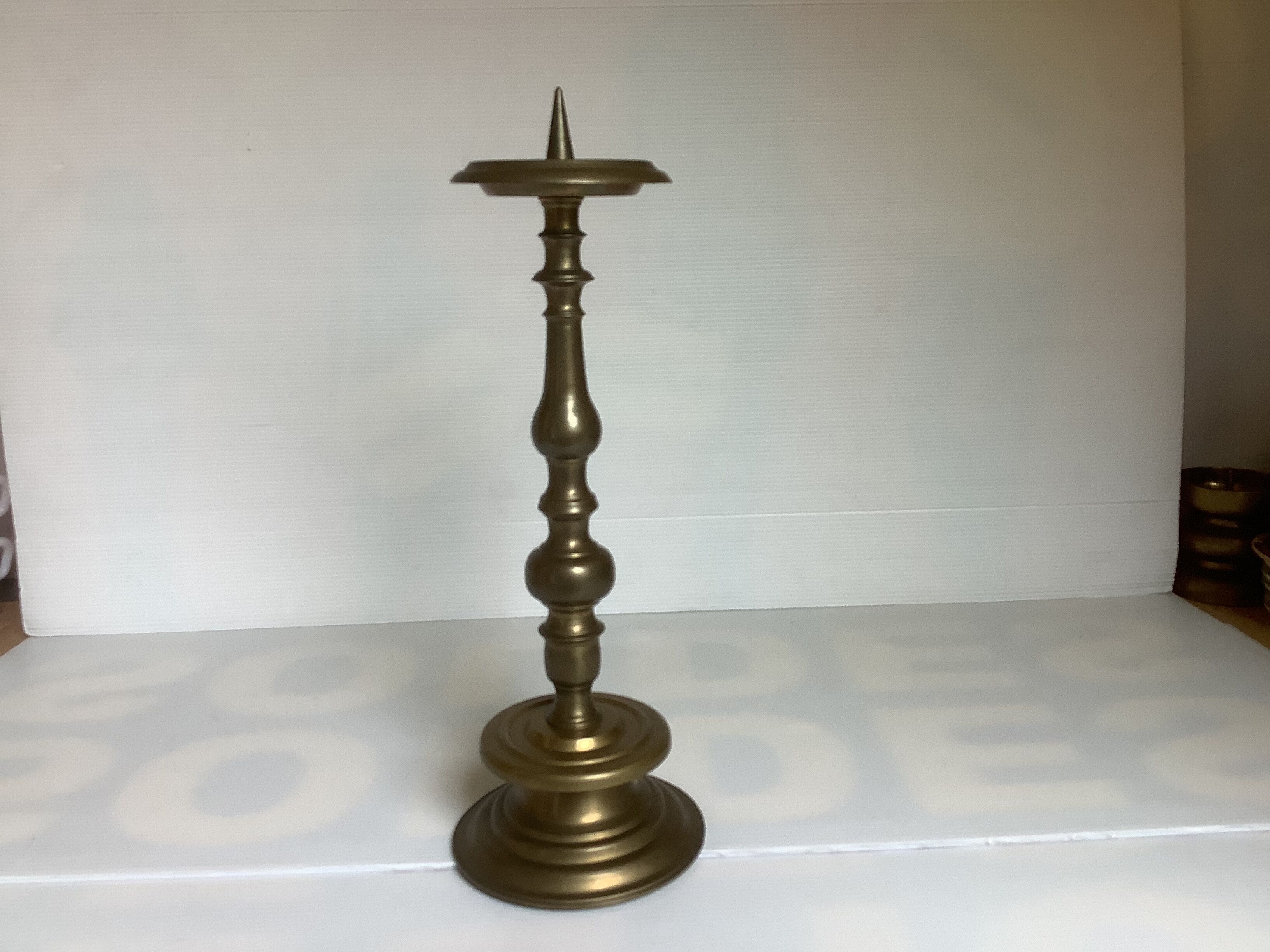 Bronze candle pique