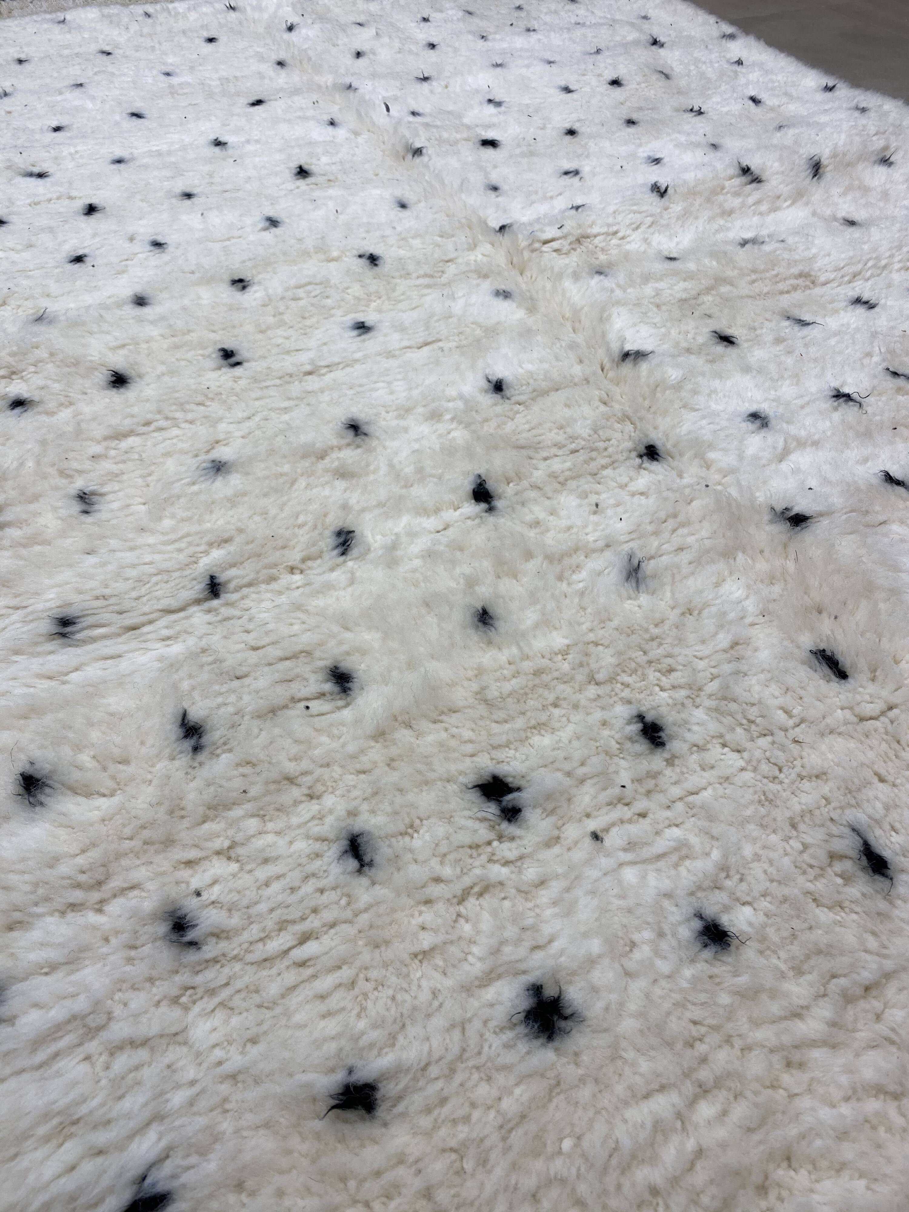 White wool mat with stitches