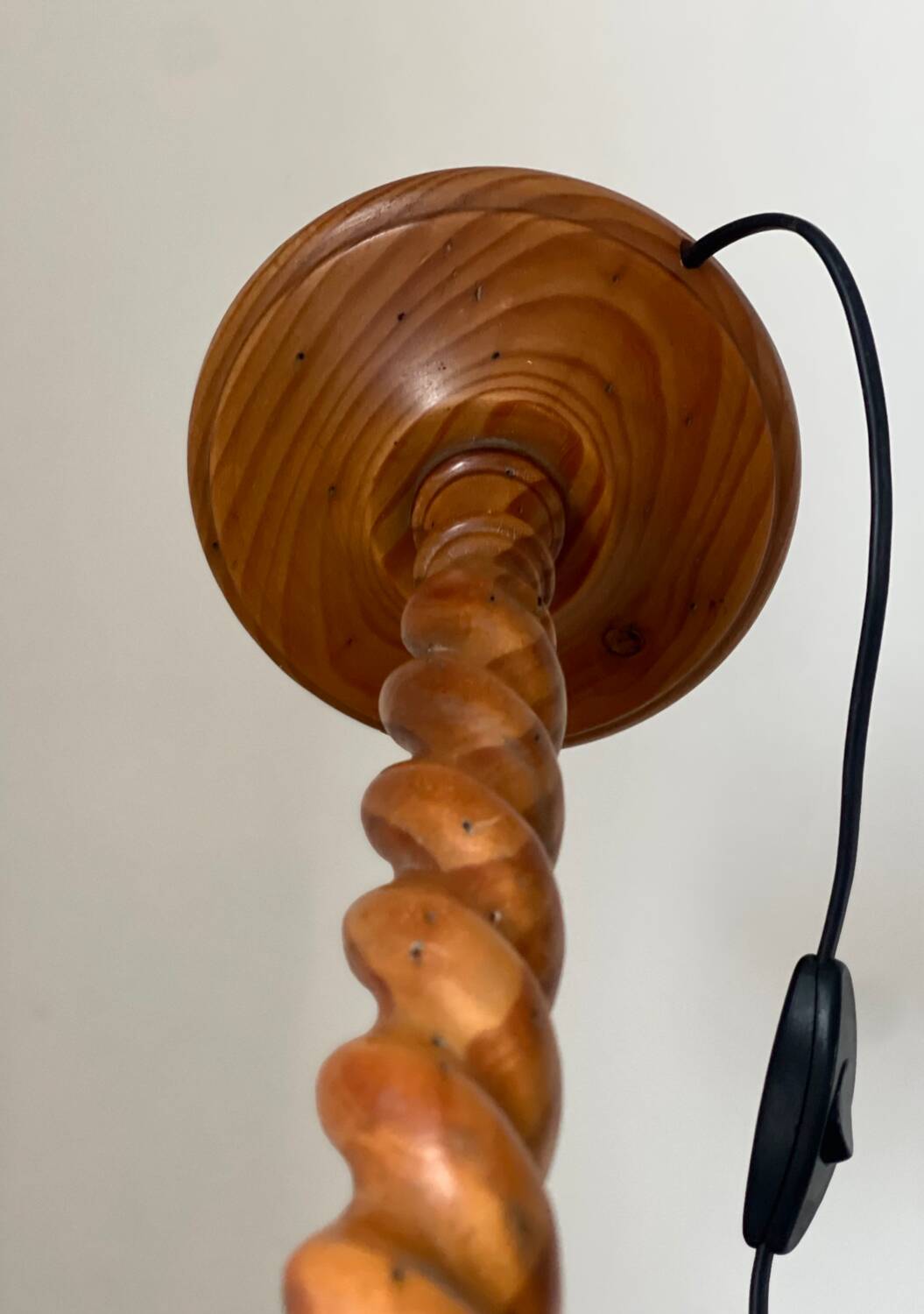 Turned wood lamp.
