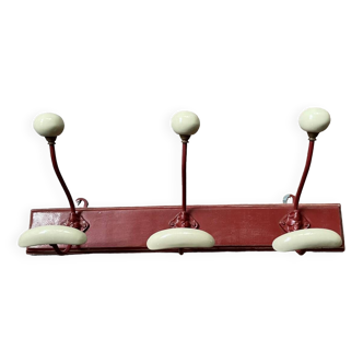 vintage wall coat rack in wood and porcelain