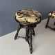 Small black round-cushionstool