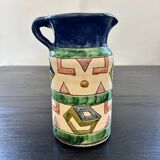 Handcrafted pitcher with graphic patterns