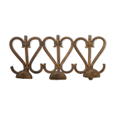 Rattan coat hanger