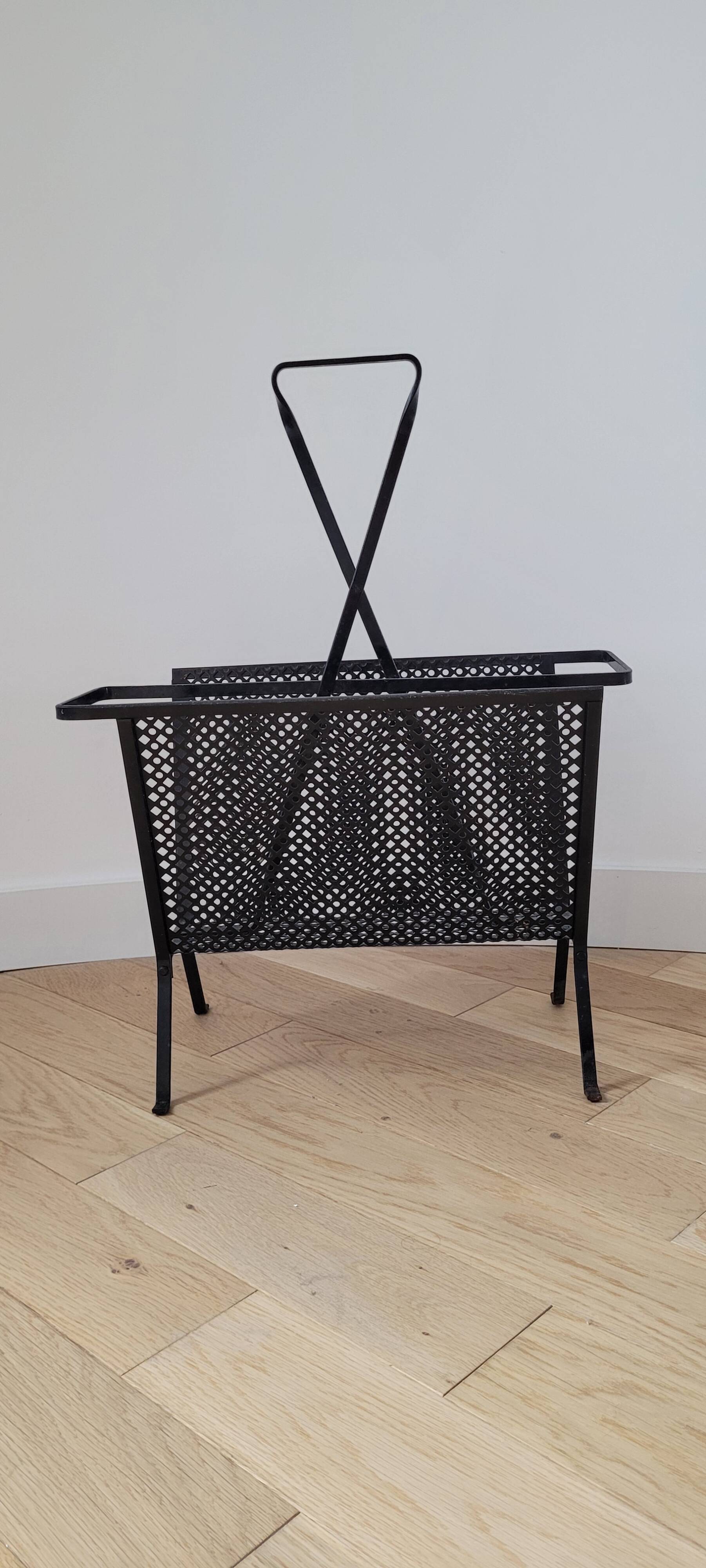 Magazine rack by Mathieu Mategot