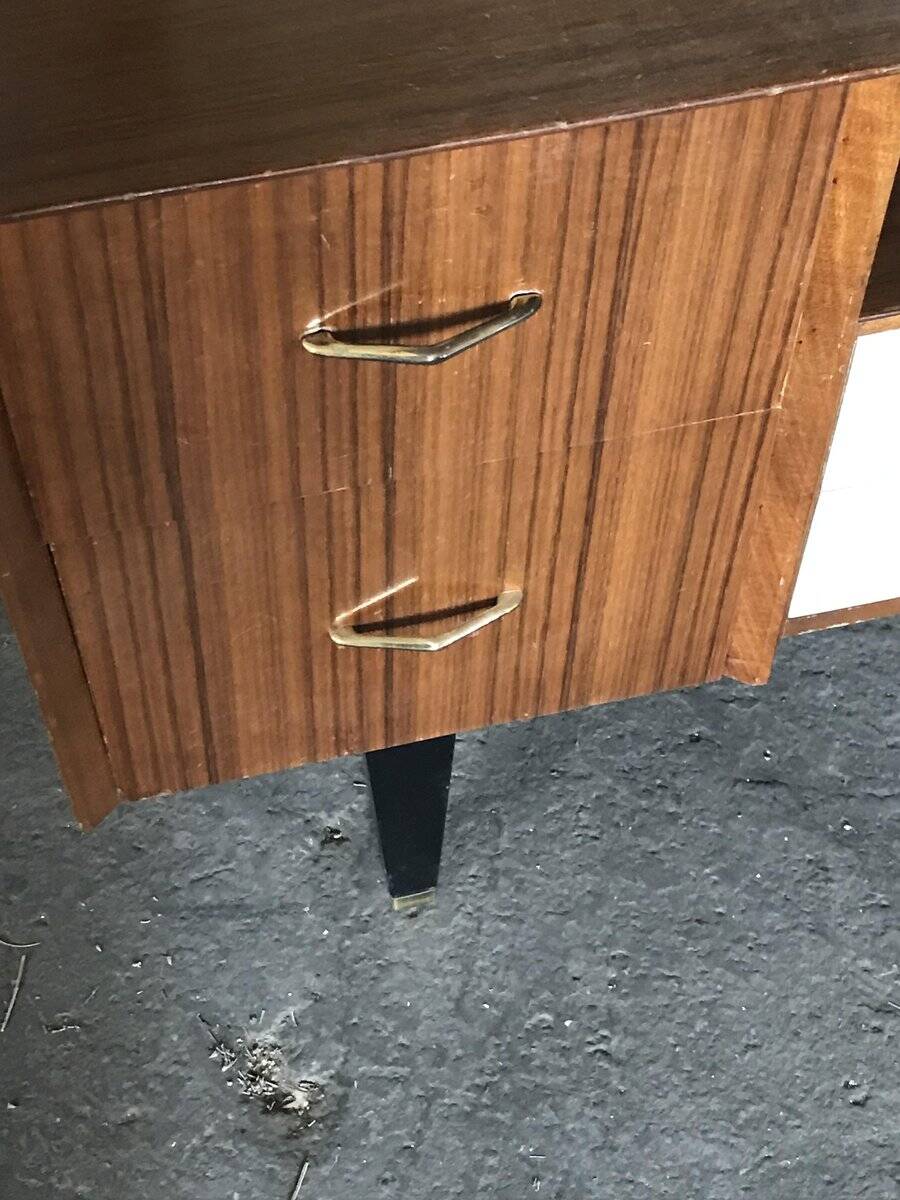 Mid-century hairdresser in brown teak and white with a mirror and brass legs.