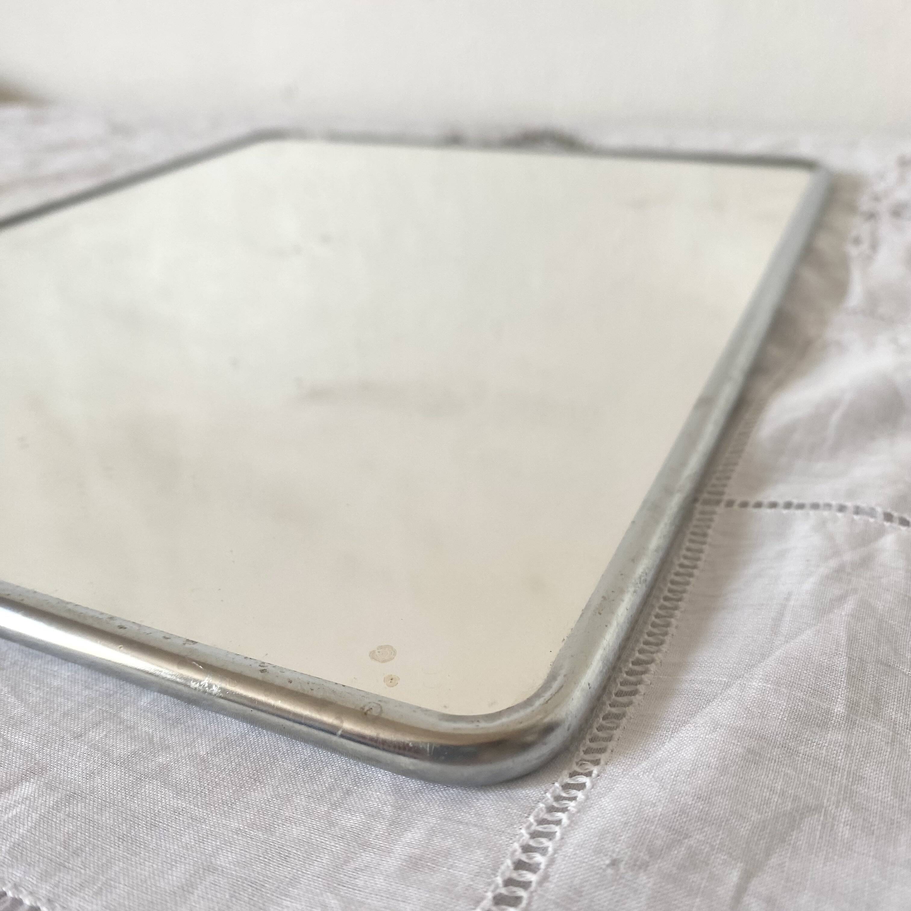 Barber's mirror with chain