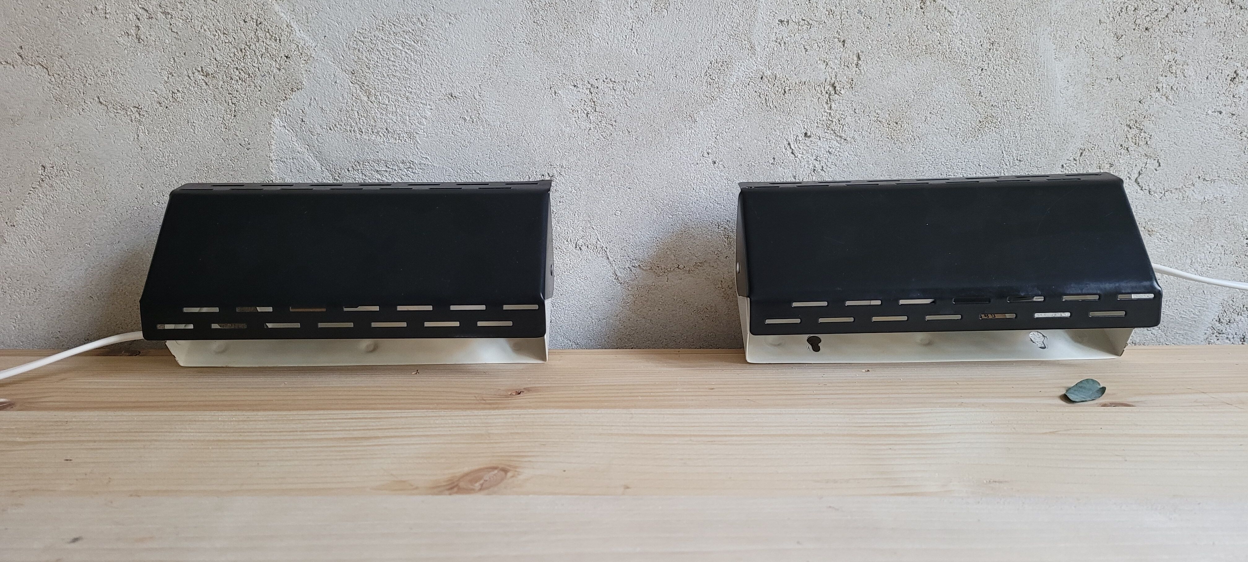 Pair of wall sconces with adjustable shutter