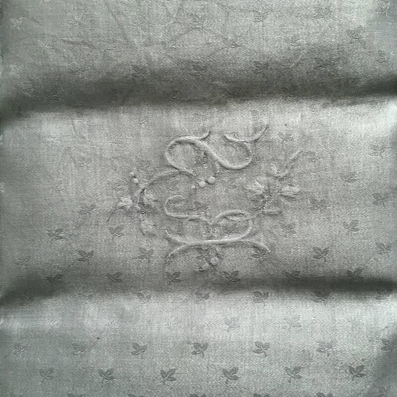 Old embroidered table napkin R S Grey
