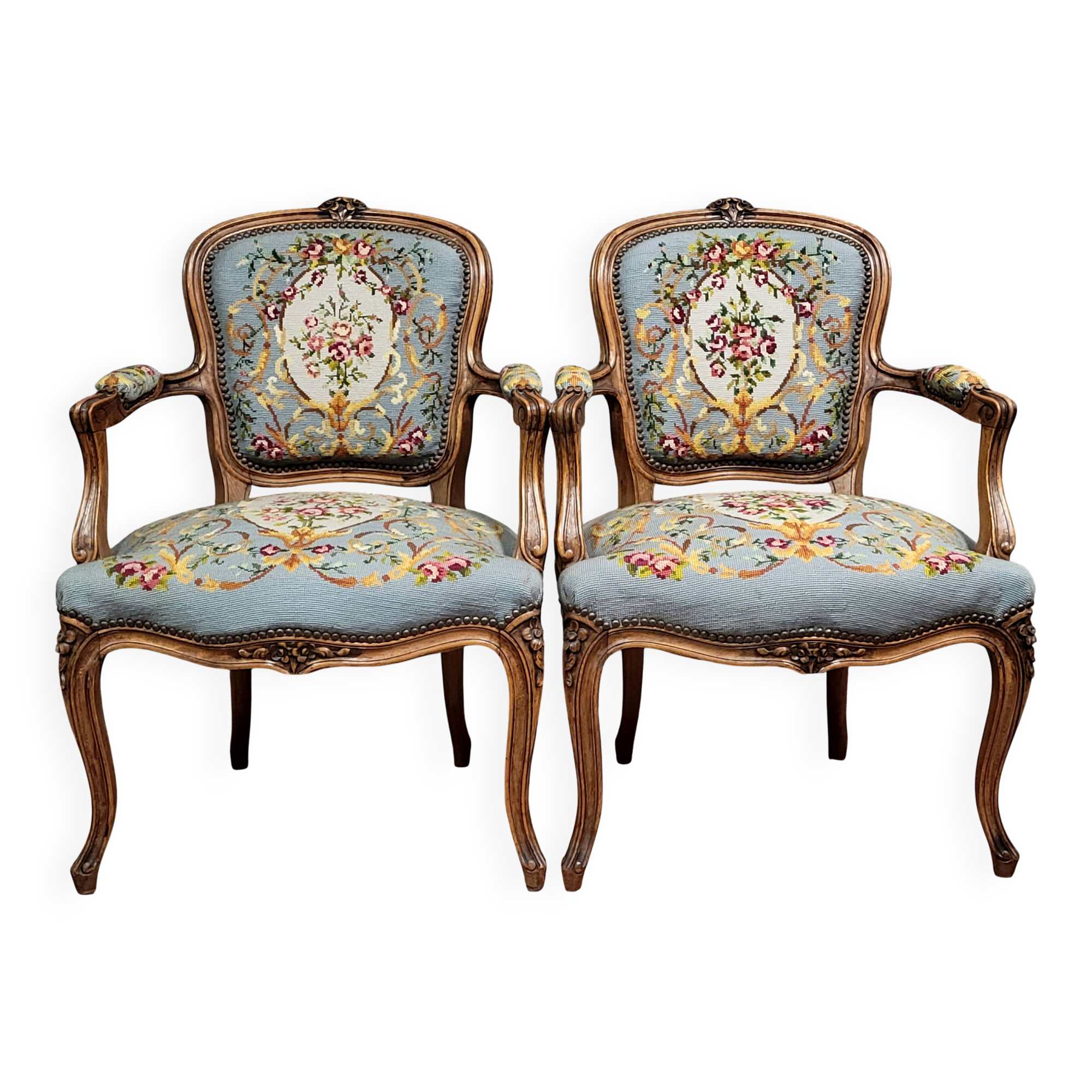 Pair of Louis XV style cabriolet armchairs in walnut