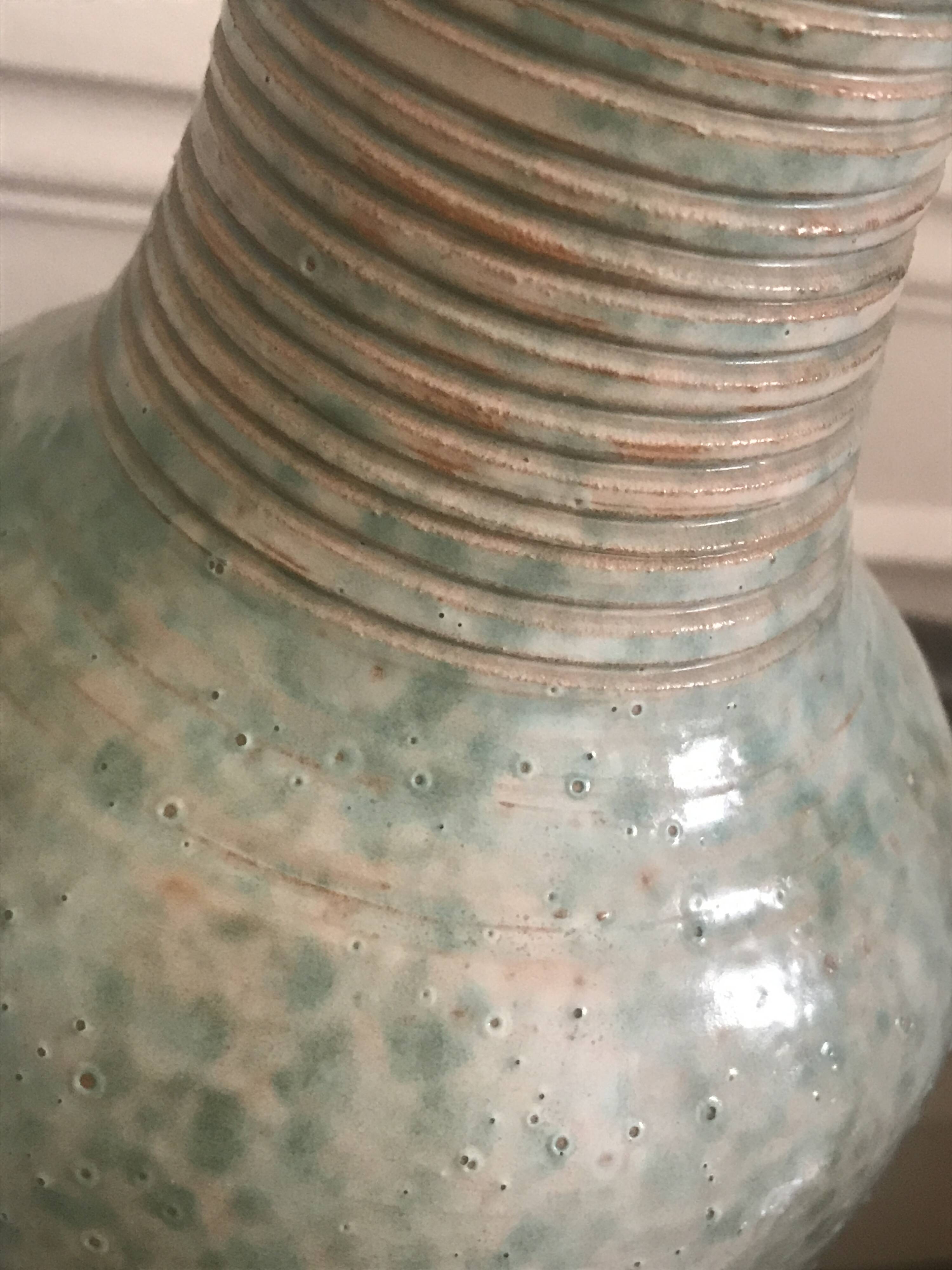 Antique turquoise terracotta vase